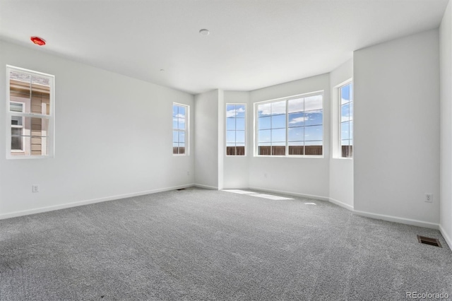19100 E 96th Pl, Commerce City, CO 80022 - carpeted empty room featuring baseboards