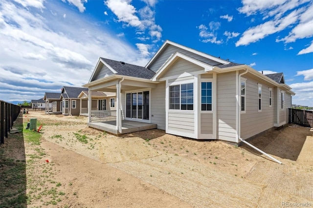 19100 E 96th Pl, Commerce City, CO 80022 - rear view of property with a patio area