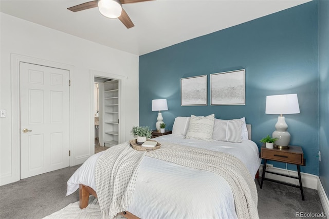 2719 W 32nd Ave, Denver, CO 80211 - carpeted bedroom with a spacious closet and a ceiling fan