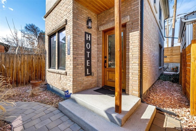 2719 W 32nd Ave, Denver, CO 80211 - view of exterior entry featuring brick siding and covered porch