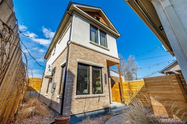 2719 W 32nd Ave, Denver, CO 80211 - view of property exterior featuring brick siding and stucco siding