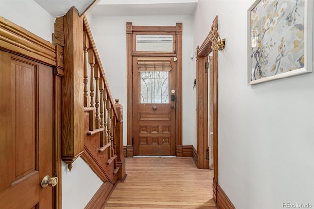 2719 W 32nd Ave, Denver, CO 80211 - doorway to outside with light wood finished floors and stairs