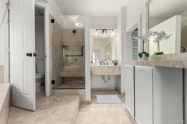 2719 W 32nd Ave, Denver, CO 80211 - full bath with a stall shower and a textured ceiling