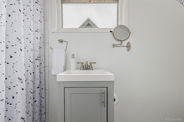 2719 W 32nd Ave, Denver, CO 80211 - full bathroom with vanity and a shower with shower curtain