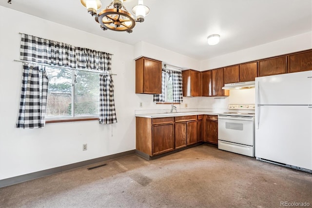 kitchen featuring hanging light fixtures, light carpet, a notable chandelier, sink, and white appliances