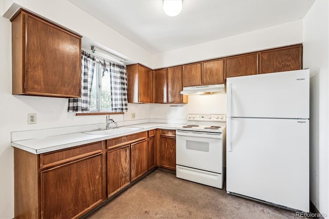 kitchen with white appliances and sink