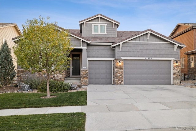 craftsman house with a garage