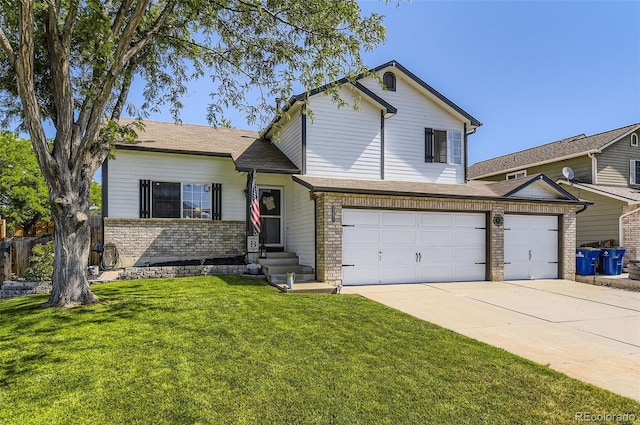 2251 W 135th Pl, Denver, CO 80234 - tri-level home with concrete driveway, a front yard, a garage, and brick siding