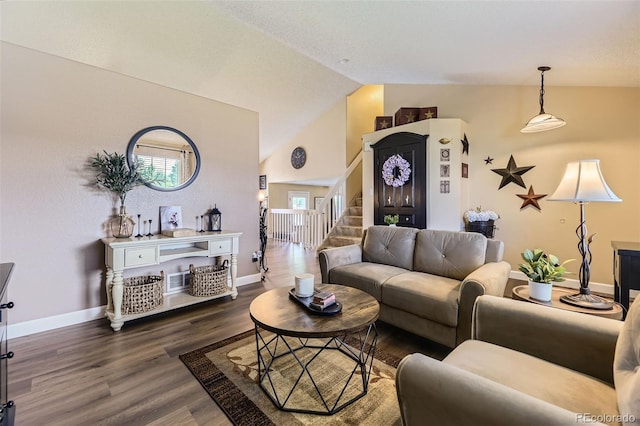 2251 W 135th Pl, Denver, CO 80234 - living room featuring vaulted ceiling, stairs, and wood finished floors