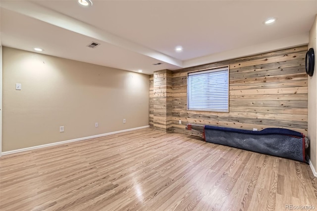 2251 W 135th Pl, Denver, CO 80234 - unfurnished living room with wood walls, wood finished floors, and recessed lighting