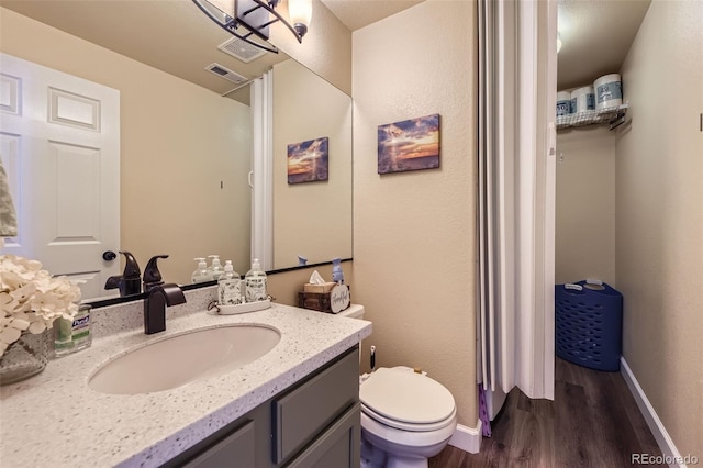 2251 W 135th Pl, Denver, CO 80234 - bathroom with wood finished floors and vanity