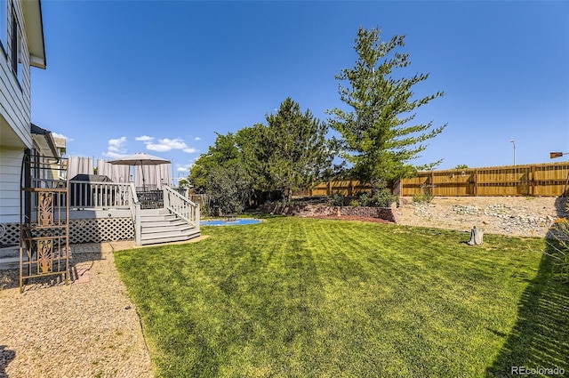 2251 W 135th Pl, Denver, CO 80234 - fenced backyard featuring a deck
