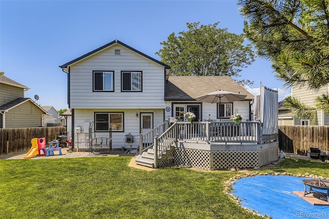2251 W 135th Pl, Denver, CO 80234 - rear view of house featuring a fenced backyard and a wooden deck