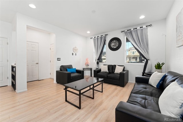 living room with light hardwood / wood-style floors