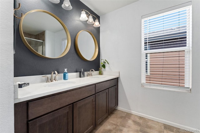 bathroom with vanity and tile patterned floors