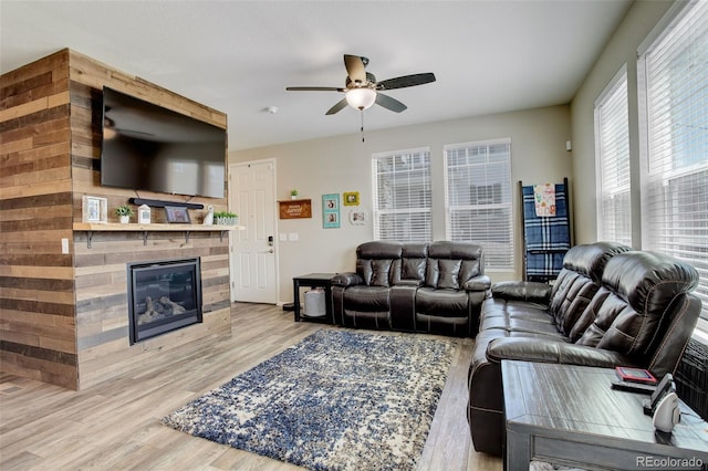 4316 S Netherland St, Aurora, CO 80015 - living room with ceiling fan, wood finished floors, and a glass covered fireplace
