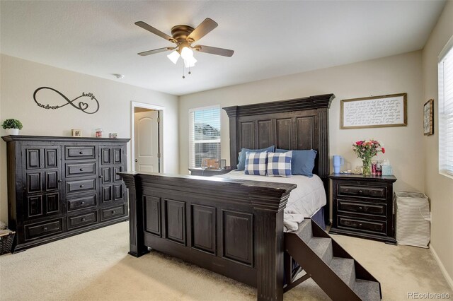 4316 S Netherland St, Aurora, CO 80015 - bedroom featuring light colored carpet, a ceiling fan, and baseboards