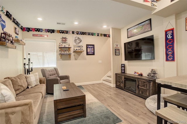 4316 S Netherland St, Aurora, CO 80015 - living room featuring wood finished floors, stairway, recessed lighting, and baseboards