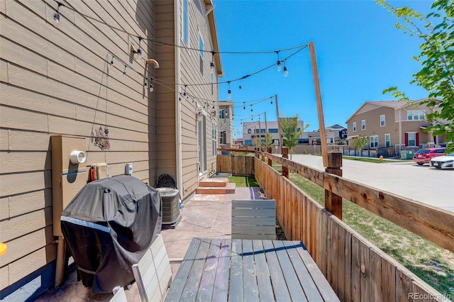 4316 S Netherland St, Aurora, CO 80015 - wooden terrace with a residential view and a grill