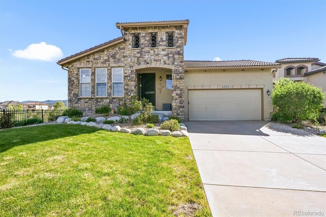 2373 S Joyce St, Denver, CO 80228 - mediterranean / spanish home featuring a garage, concrete driveway, stone siding, and a tile roof