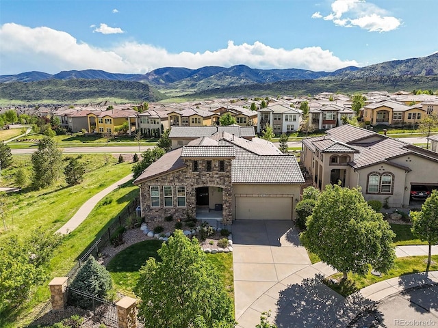 2373 S Joyce St, Denver, CO 80228 - aerial view of residential area featuring a mountain backdrop