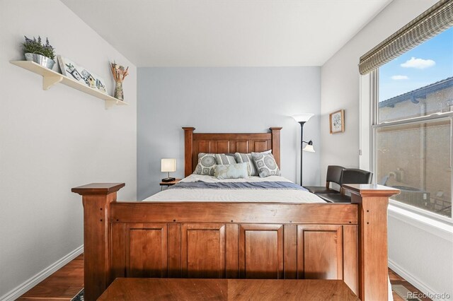 2373 S Joyce St, Denver, CO 80228 - bedroom with wood finished floors and baseboards