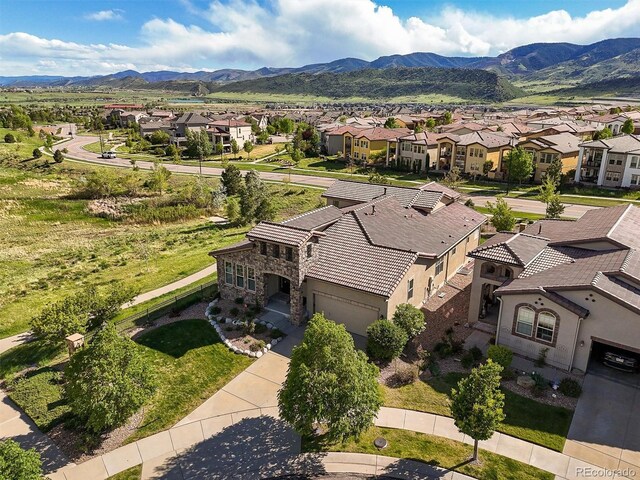 2373 S Joyce St, Denver, CO 80228 - aerial perspective of suburban area featuring a mountainous background