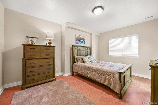 2373 S Joyce St, Denver, CO 80228 - bedroom with baseboards and light wood-style floors