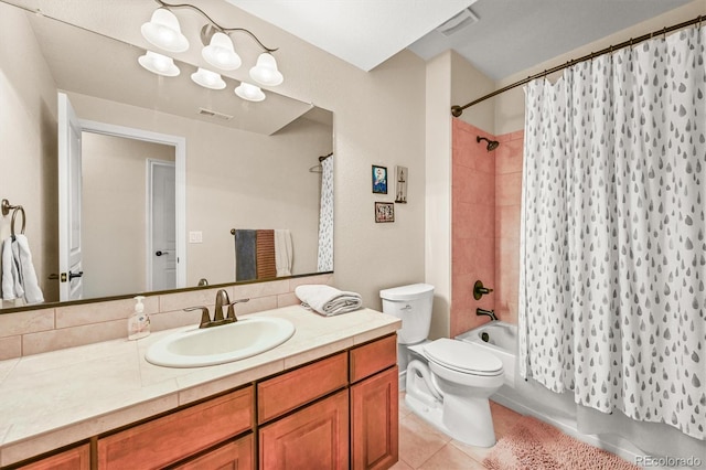 2373 S Joyce St, Denver, CO 80228 - bathroom featuring tile patterned flooring, shower / bath combo with shower curtain, tasteful backsplash, vanity, and toilet