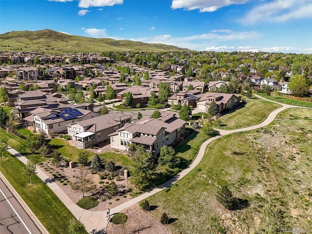 2373 S Joyce St, Denver, CO 80228 - aerial perspective of suburban area with a mountain backdrop