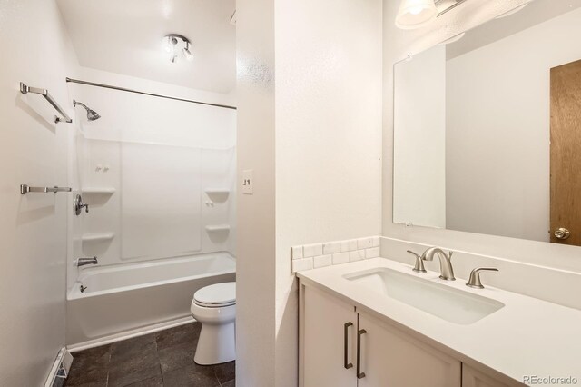 3021 11th Ave Unit 15, Evans, CO 80620 - full bath featuring vanity, toilet, and bathing tub / shower combination