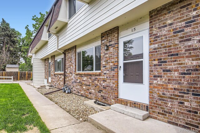 3021 11th Ave Unit 15, Evans, CO 80620 - property entrance with brick siding