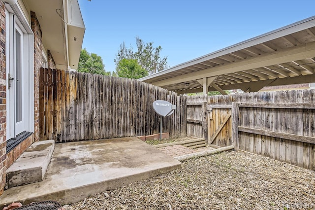 3021 11th Ave Unit 15, Evans, CO 80620 - view of yard featuring a gate and a patio