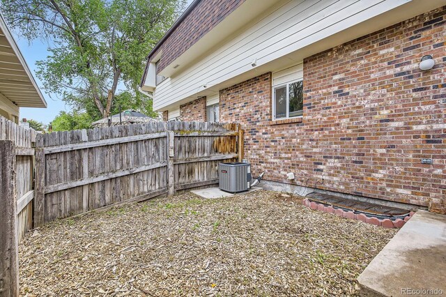 3021 11th Ave Unit 15, Evans, CO 80620 - view of yard with central air condition unit