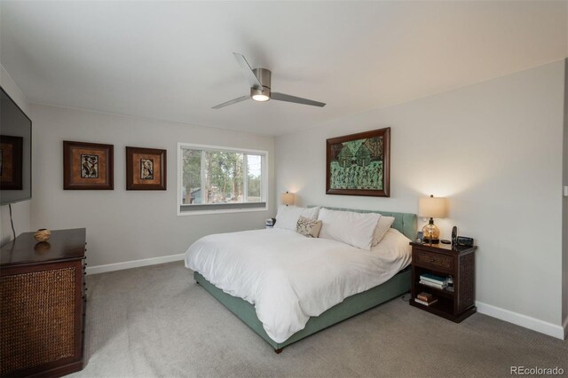5382 S Pine Rd, Evergreen, CO 80439 - carpeted bedroom featuring baseboards and ceiling fan