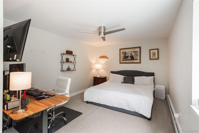 5382 S Pine Rd, Evergreen, CO 80439 - carpeted bedroom featuring a baseboard radiator, a desk, baseboards, and ceiling fan