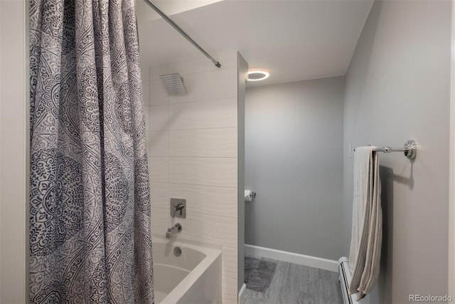 5382 S Pine Rd, Evergreen, CO 80439 - full bathroom featuring baseboards, shower / tub combo, wood finished floors, and a baseboard radiator