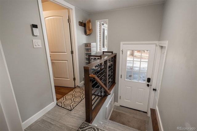 5382 S Pine Rd, Evergreen, CO 80439 - entryway with plenty of natural light and baseboards