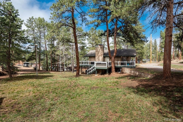 5382 S Pine Rd, Evergreen, CO 80439 - view of green lawn featuring stairs