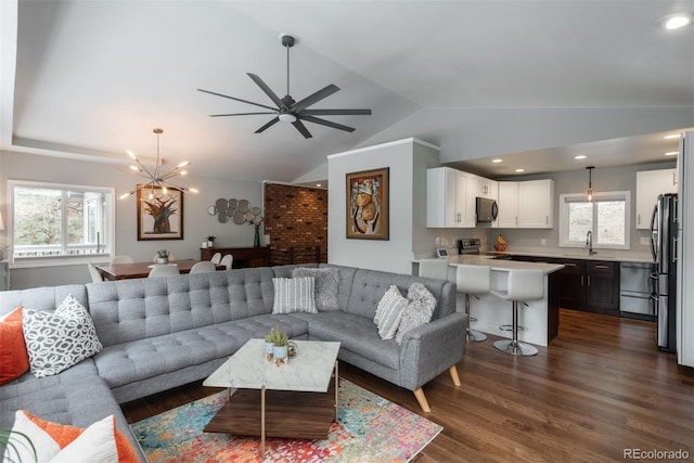 5382 S Pine Rd, Evergreen, CO 80439 - living room with dark wood-style flooring, vaulted ceiling, plenty of natural light, a ceiling fan, and recessed lighting