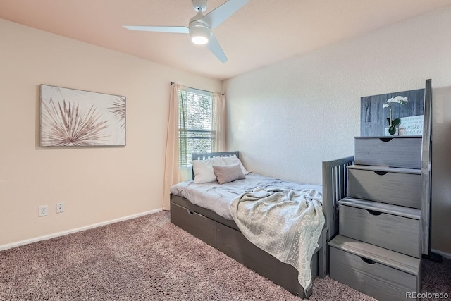 bedroom with baseboards, carpet, and ceiling fan