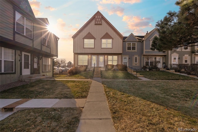 view of front of home with a yard