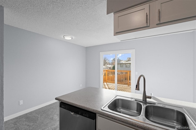 kitchen with carpet, sink, stainless steel dishwasher, gray cabinets, and a textured ceiling