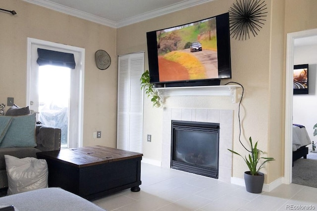 tiled living room featuring a tile fireplace and ornamental molding