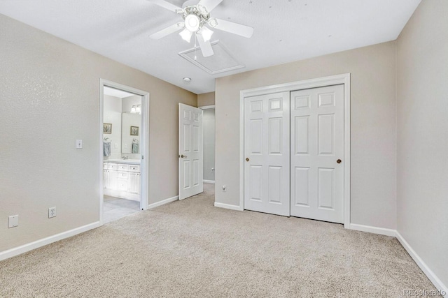598 Crossing Cir, Castle Pines, CO 80108 - unfurnished bedroom with light colored carpet, baseboards, a closet, and ensuite bathroom