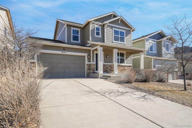 view of front of home with a garage and covered porch