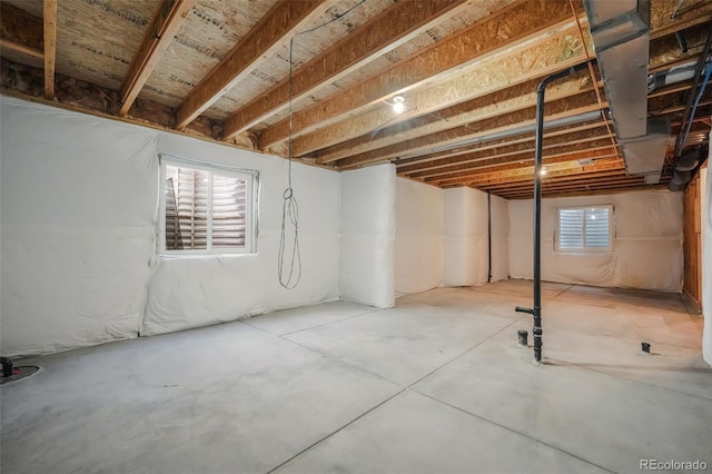 basement featuring plenty of natural light