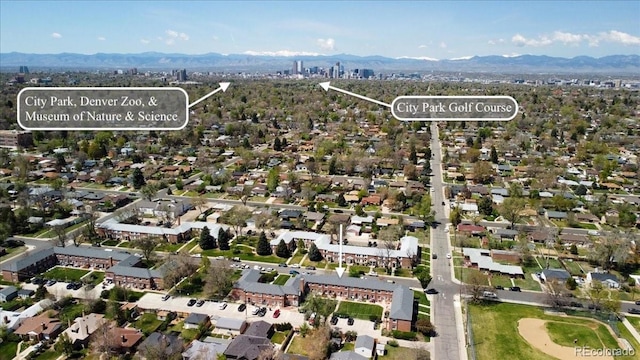 2872 Jasmine St, Denver, CO 80207 - aerial view of property and surrounding area with mountains and nearby suburban area
