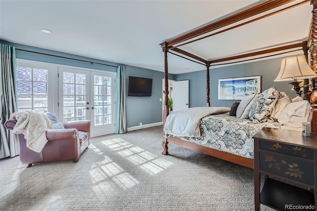 carpeted bedroom featuring access to exterior and french doors