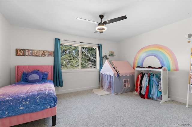 bedroom featuring baseboards, carpet floors, and ceiling fan